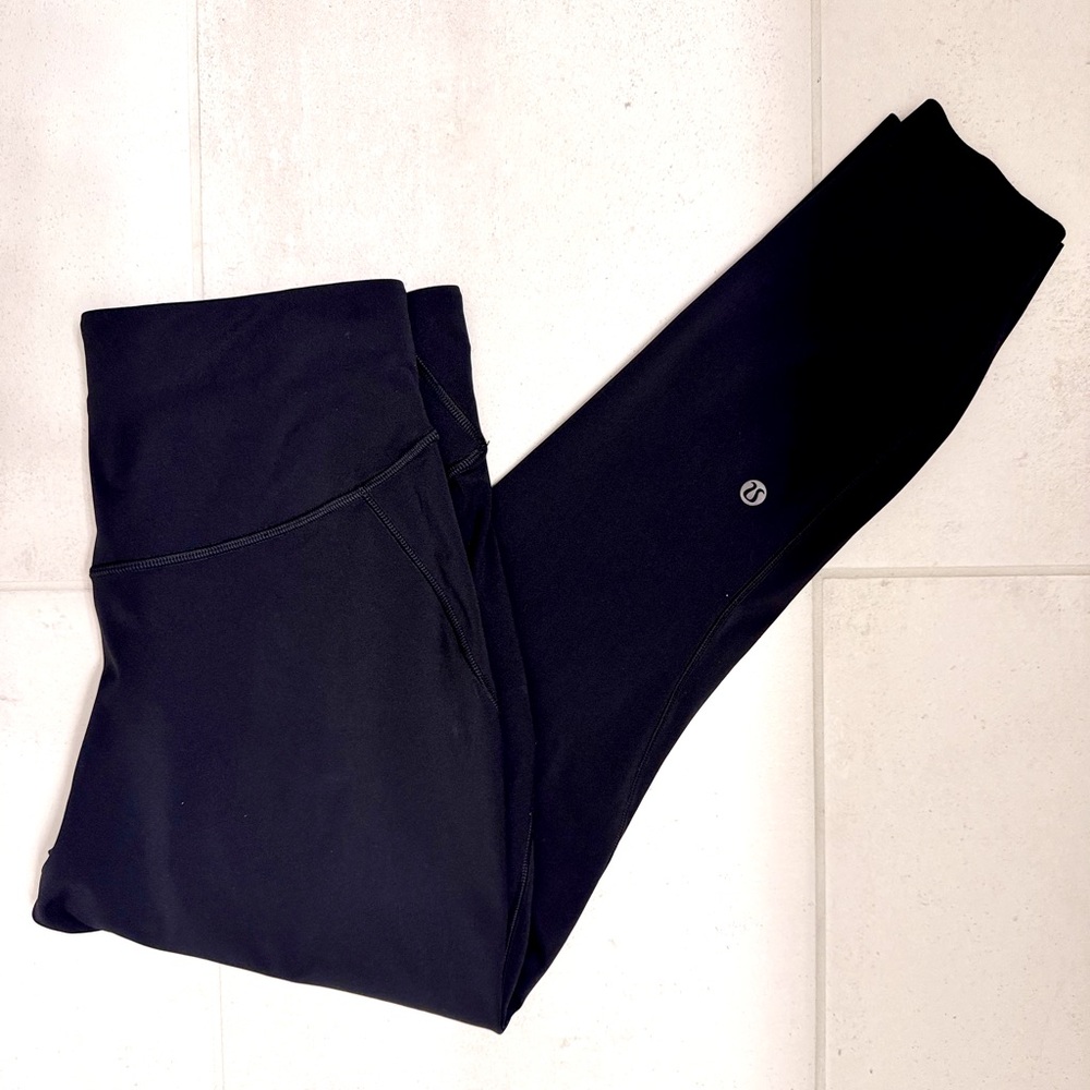 SOLD—-LULULEMON Black Leggings size 10 - Base Pace High Rise Tight 25”